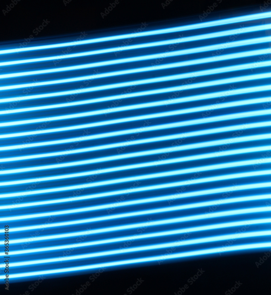 Moving neon lights texture. Blue LED neon light lamp on long exposure shot. Moving neon lights texture. Blue LED neon light lamp on long exposure shot.