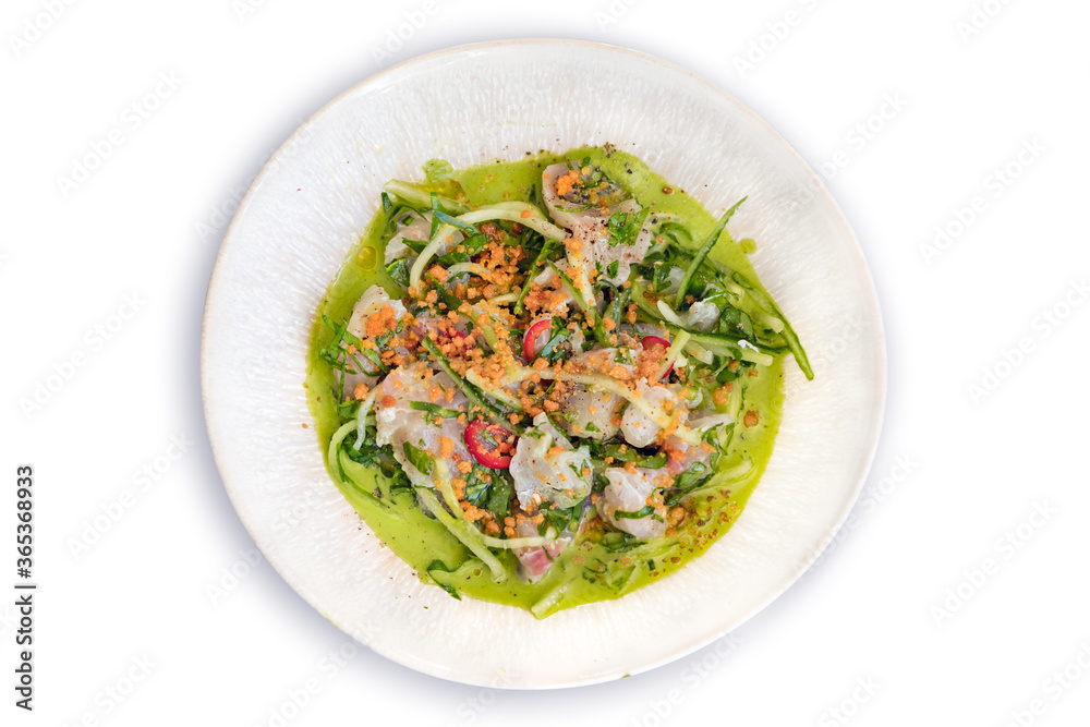 Ceviche Fricasee with green sauce and vegetables. Greek and Peruvian cuisine fusion. Top view of a healthy gourmet dish. Ceviche Fricasee with green sauce and vegetables. Greek and Peruvian cuisine fusion. Top view of a healthy gourmet dish.