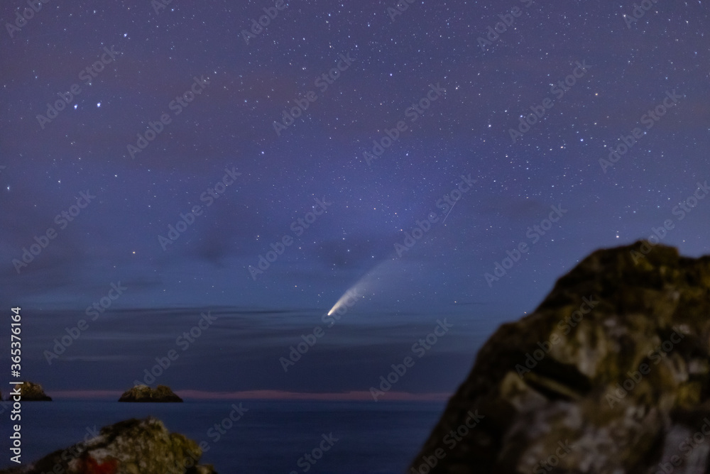 Comet NEOWISE on the cliffs of Playa de Usgo, Spain