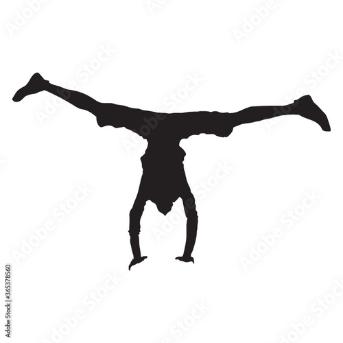 silhouette of a man dancing