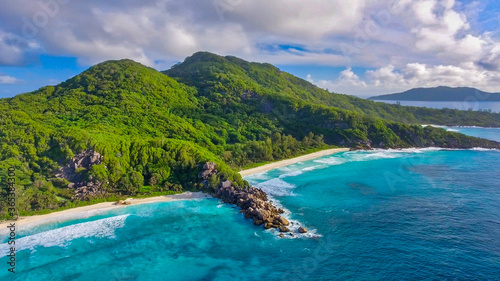 Fototapeta Naklejka Na Ścianę i Meble -  La Digue, Seychelles Island. Amazing aerial view of beach and ocean from a drone
