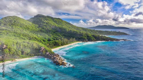Amazing aerial view of Grand Anse in La Digue Island, Seychelles. Ocean and forest © jovannig
