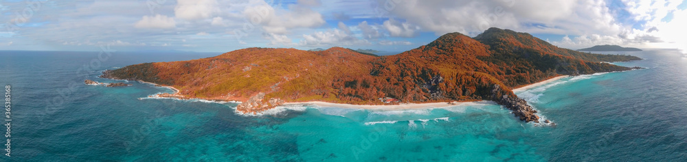 Fototapeta premium La Digue, Seychelles Island. Amazing aerial view of beach and ocean from a drone