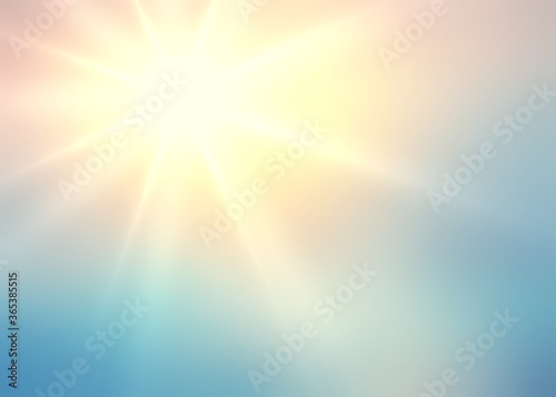 Bright sun rays on sky empty background. Yellow blue gradient blurred texture. 