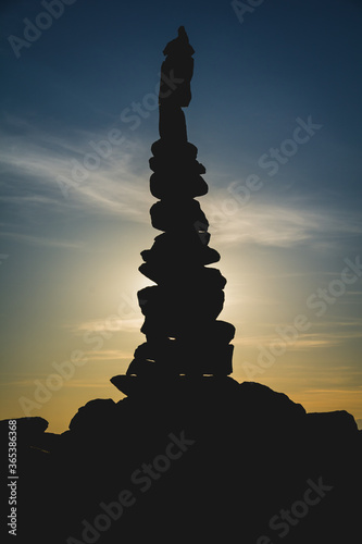 Sihouette of Rock Cairns at Joshua Tree National Park at Sunset in California