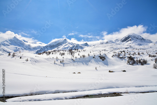 View of Piz Palu and Piz Bernina along Bernina Express train near Ospizio Bernina
