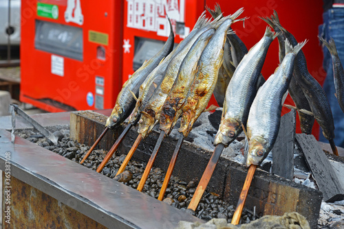 Grilled fish in front of a famous japanese restaurant in Otaru