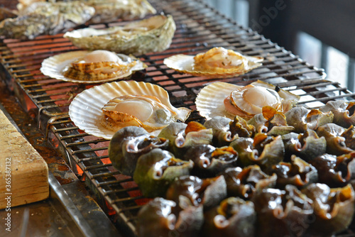 Grilled scallops and shellfish in a famous japanese restaurant in Otaru