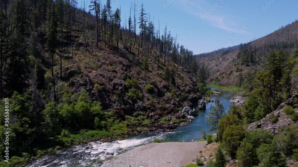 Aerial view drone shot of flying down river with small rapid and gravel bar during summer part 3 Aerial view drone shot of flying down river with small rapid and gravel bar during summer part 3