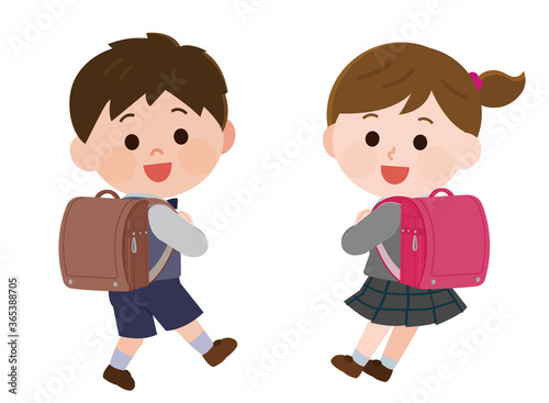 ランドセルを背負って嬉しそうな小学生低学年男女　イラスト