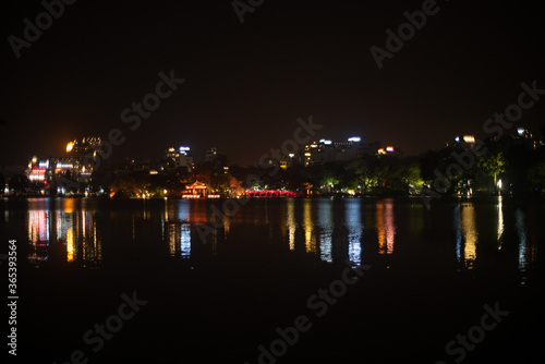 Lights reflecting off lake in Hanoi, Vietnam