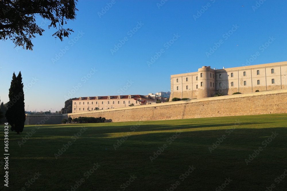 Fototapeta premium Beautiful view of fortress wall of Cartagena, Spain in the light of the morning sun