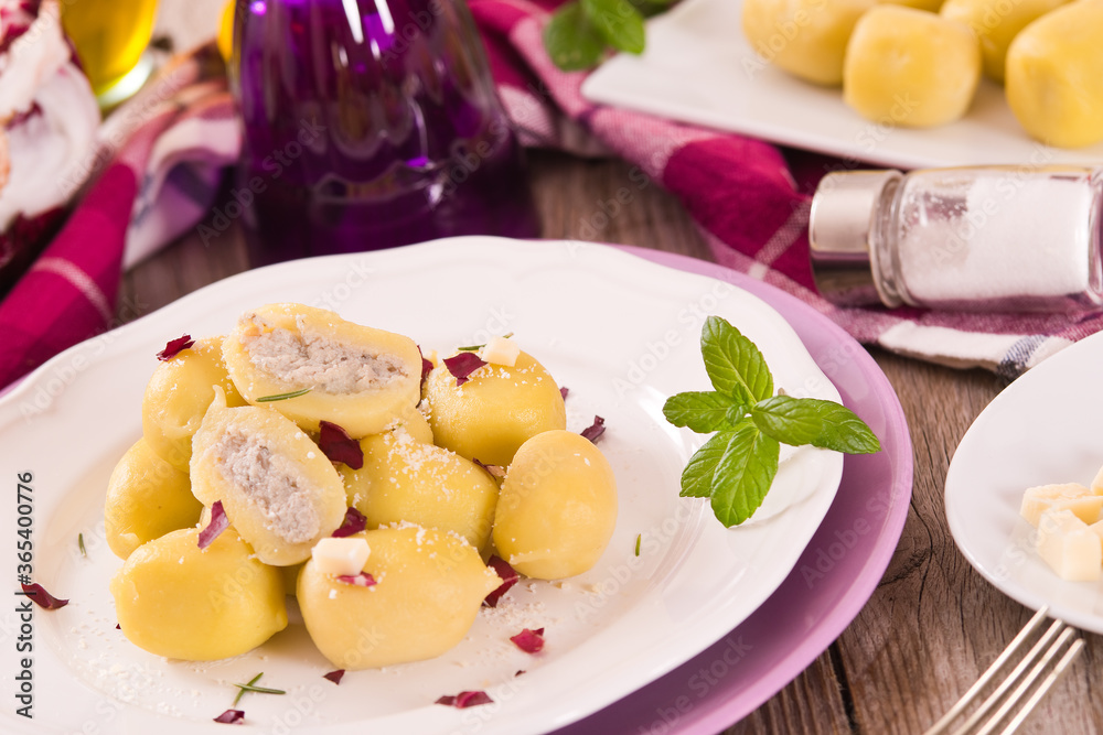 Potato gnocchi stuffed with radicchio and ricotta. Potato gnocchi stuffed with radicchio and ricotta.