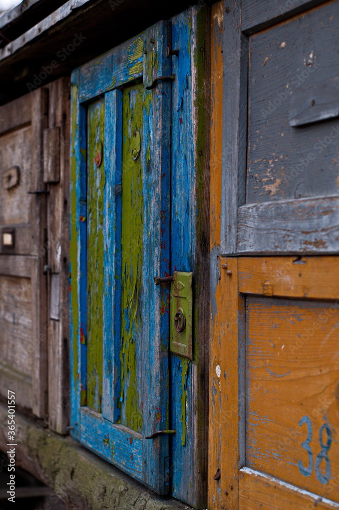 old colored door from a beehive