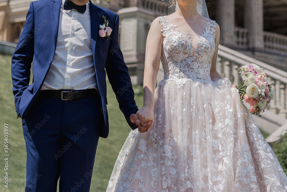 groom with bride together in summer park groom with bride together in summer park