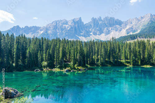 Carezza lake (Lago di Carezza, Karersee) with Mount Latemar, Bolzano province, South tyrol, Italy. Landscape of Lake Carezza or Karersee and Dolomites in background, Nova Levante, Bolzano, Italy. © Martin
