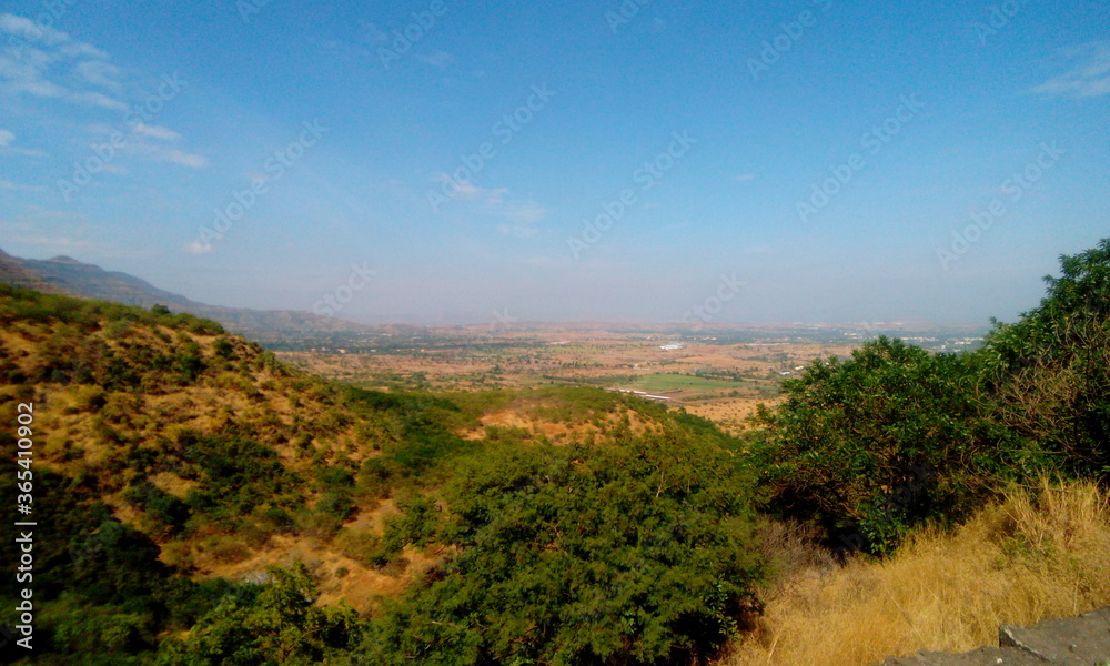 Beauty of Nature. I clicked photo at roadside area. It's merge of  mountains and sky.