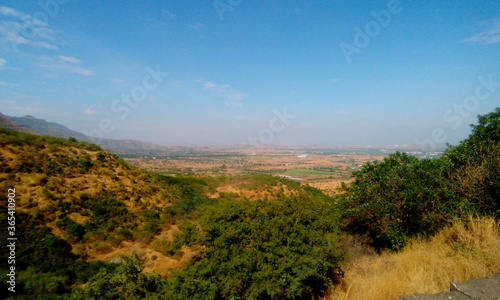 Beauty of Nature. I clicked photo at roadside area. It s merge of  mountains and sky.