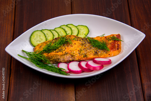 baked salmon steak with mustard breading, honey and spices