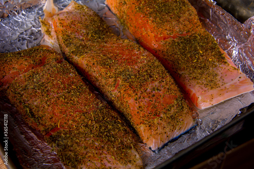 Pickled pieces of raw salmon with spices.