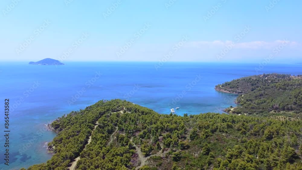 Aerial view of exotic blue sea and coast rich with greenery Aerial view of exotic blue sea and coast rich with greenery