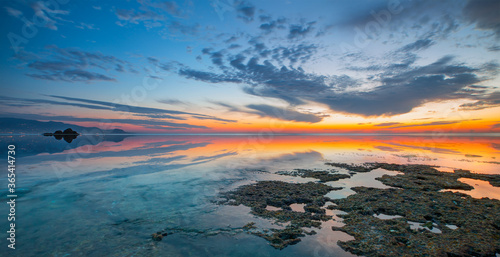 Long exposure image of dramatic sky with rock in sunset - Alanya, Antalya