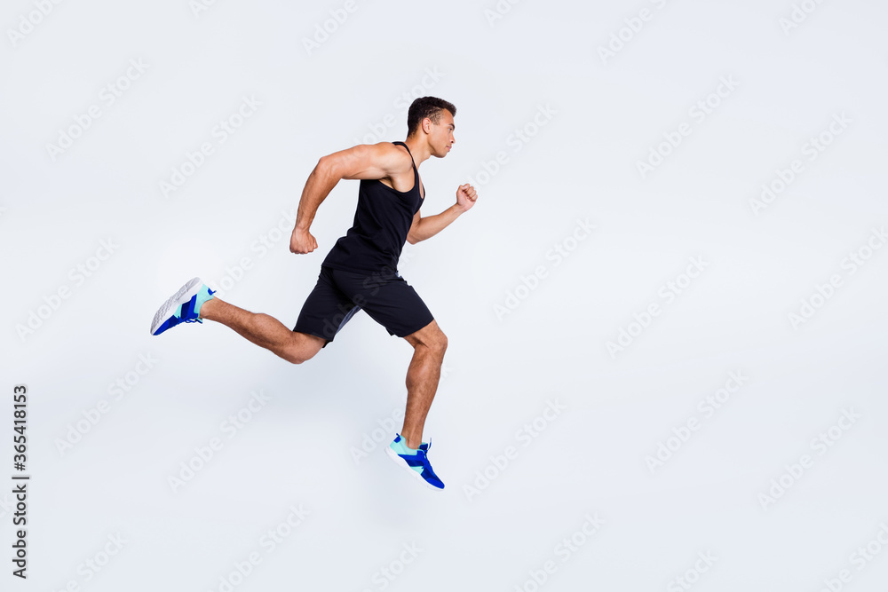 Full length body size view of his he nice attractive strong sportive muscular focused guy jumping running fast championship isolated over light gray pastel color background
