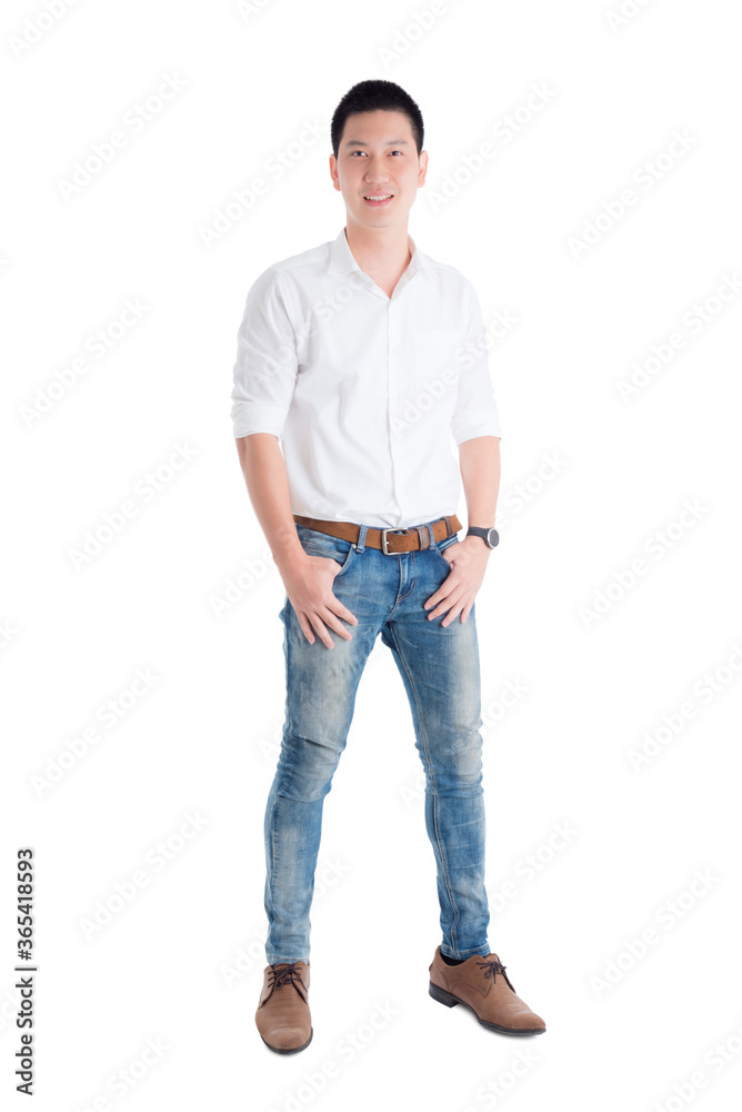 Full length of asian handsome man in white shirt standing and smiles over white background. Full length of asian handsome man in white shirt standing and smiles over white background.