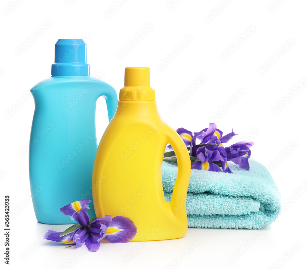 Detergent with washing powder and towels isolated on white