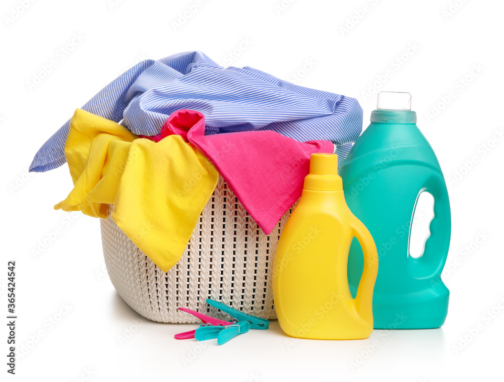 Detergent with washing powder and towels isolated on white Detergent with washing powder and towels isolated on white