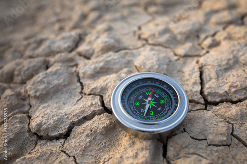 compass on the dry soil