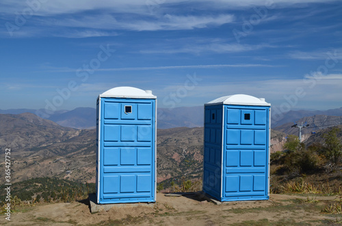 Wallpaper Mural Two portable toilets on the top of the mountain for tourists, next to the cable car. Beldersay Mountains, Uzbekistan. Torontodigital.ca