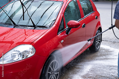 car washing cleaning with foam and hi pressured water