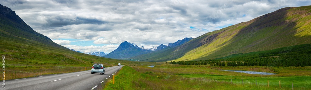 Panorama beautiful view summer of car trip on the road at north land in Iceland, Concept of travel summer in Iceland Panorama beautiful view summer of car trip on the road at north land in Iceland, Concept of travel summer in Iceland