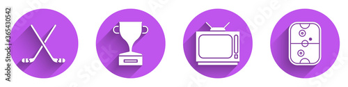 Set Ice hockey sticks, Award cup, Retro tv and Air hockey table icon with long shadow. Vector.