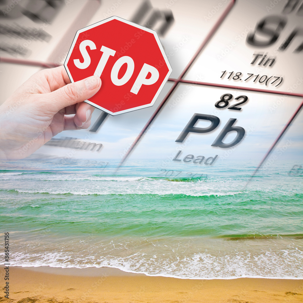Stop pollution from dangerous lead and heavy metals in seawater concept with hand holding a