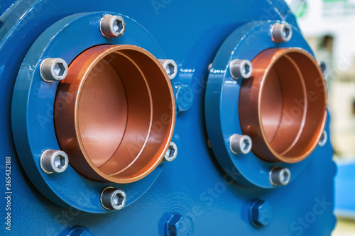 thick copper pipes with flanges for cooling or air conditioning systems photo