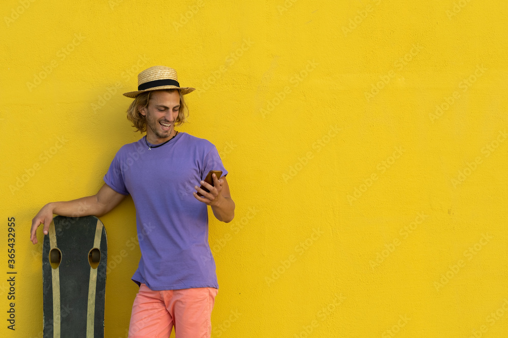 Young blond man with summer clothes Young blond man with summer clothes