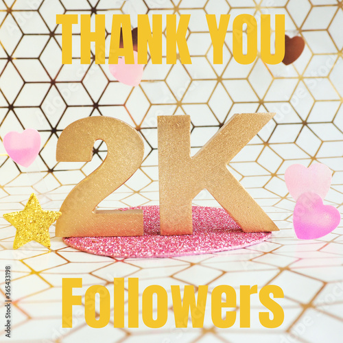 Lettering in gold volumetric letters 