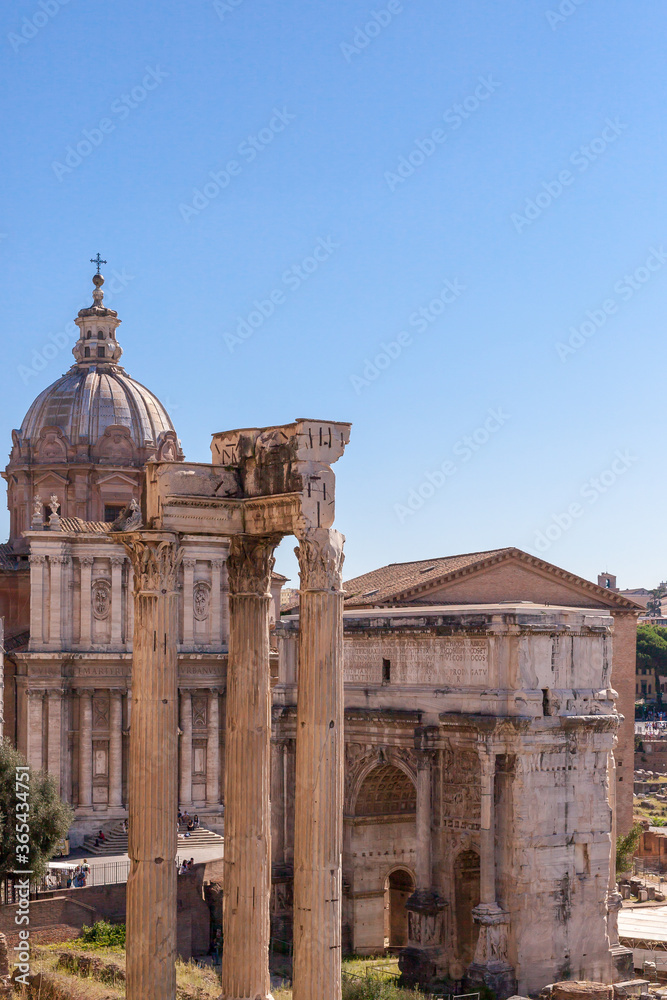ROME, ITALY - 2014 AUGUST 18. Santi Luca e Martina, a catholic church at the Roman surrounded by the ruins in Rome.