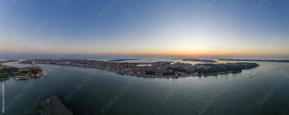 Aerial panorama of the lagoon of Venice and Lido island during sunrise