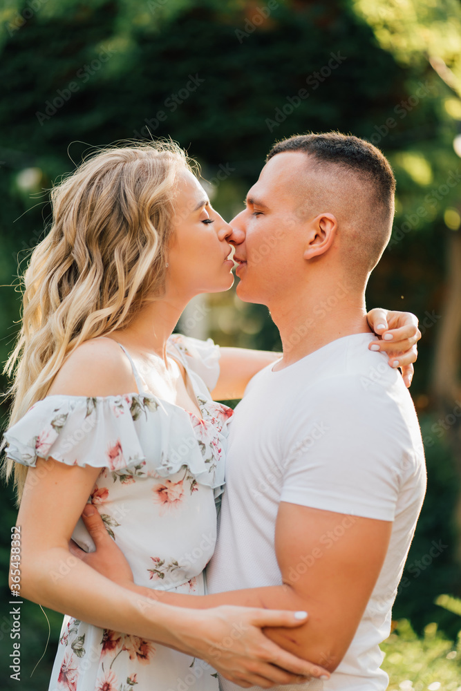 Fototapeta premium beautiful and happy couple having fun in garden.