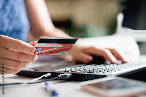 Woman buying online with credit card. Online shopping.
