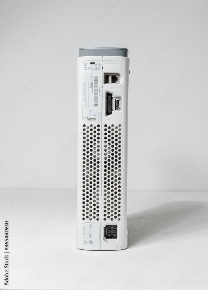 london, england, 05/05/20202 A slim line white Microsoft xbox 360 elite  home arcade console isolated on a white studio background. Video game  players, playstation vs xbox Stock Photo | Adobe Stock