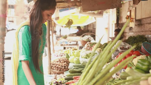 Indian woman in Mumbai buying vegetables