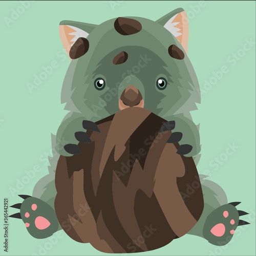 wombat hugging a pile of dirt