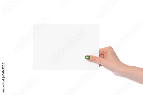 Woman's hand showing white paper banner isolated on white