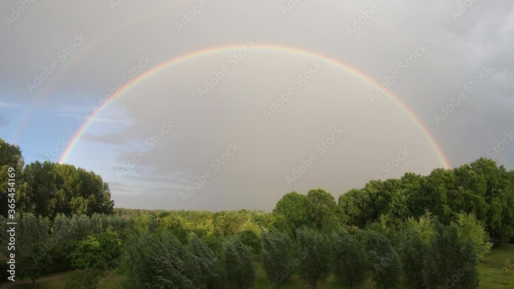 180 degrees original rainbow arch / blue sky and clouds timelapse 180 degrees original rainbow arch / blue sky and clouds timelapse