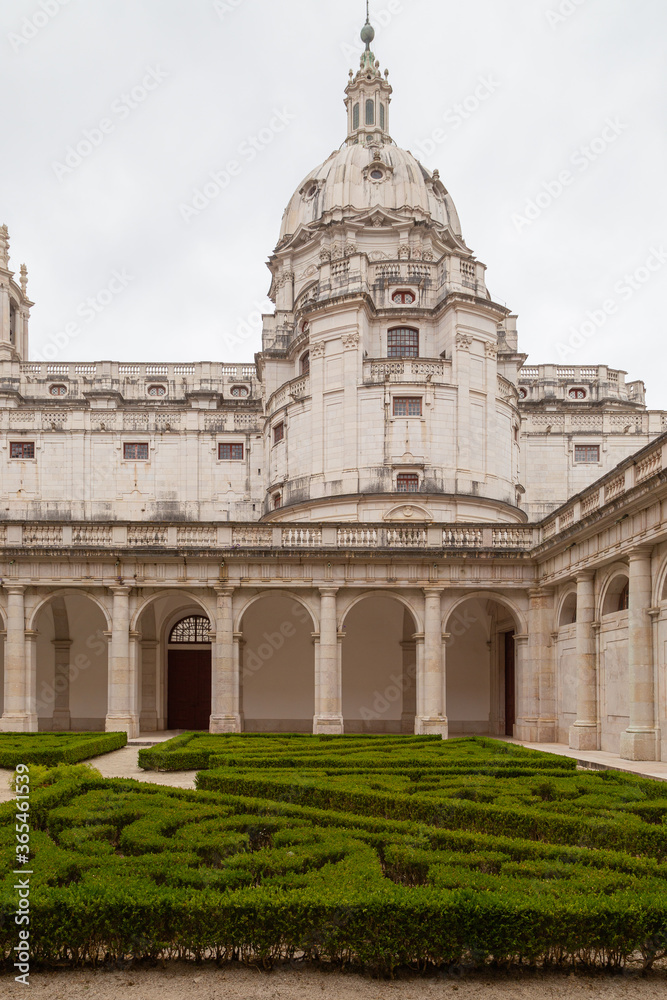 Fototapeta premium Palace of Mafra, Portugal. History landmark in cloud day