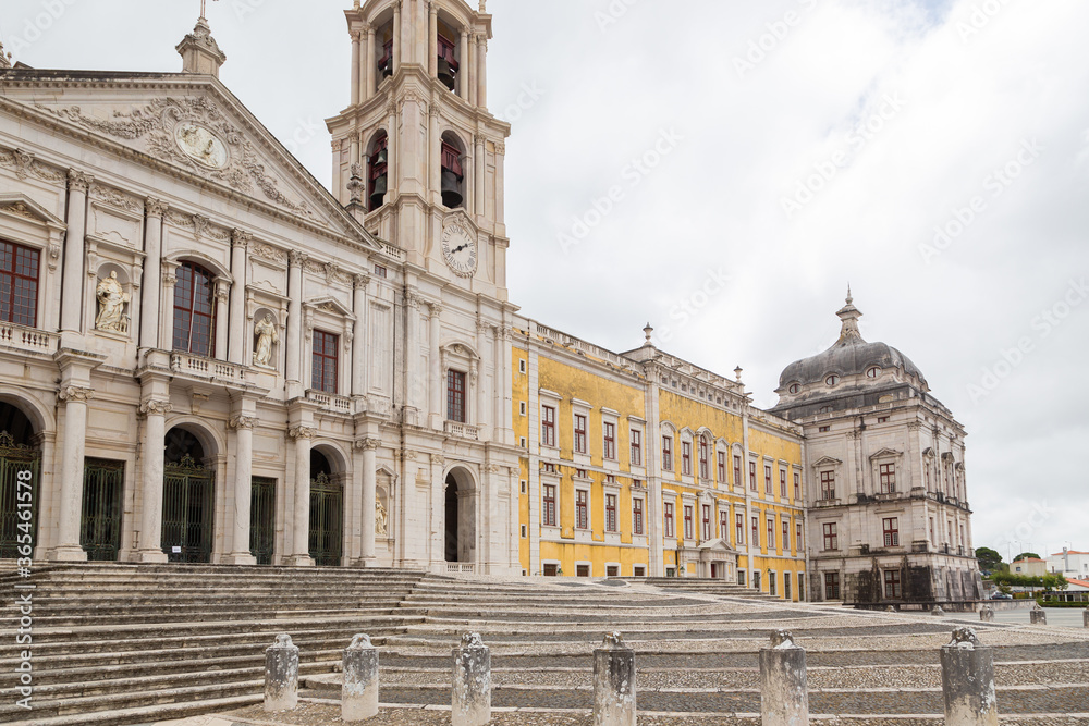Palace of Mafra, Portugal. History landmark in cloud day